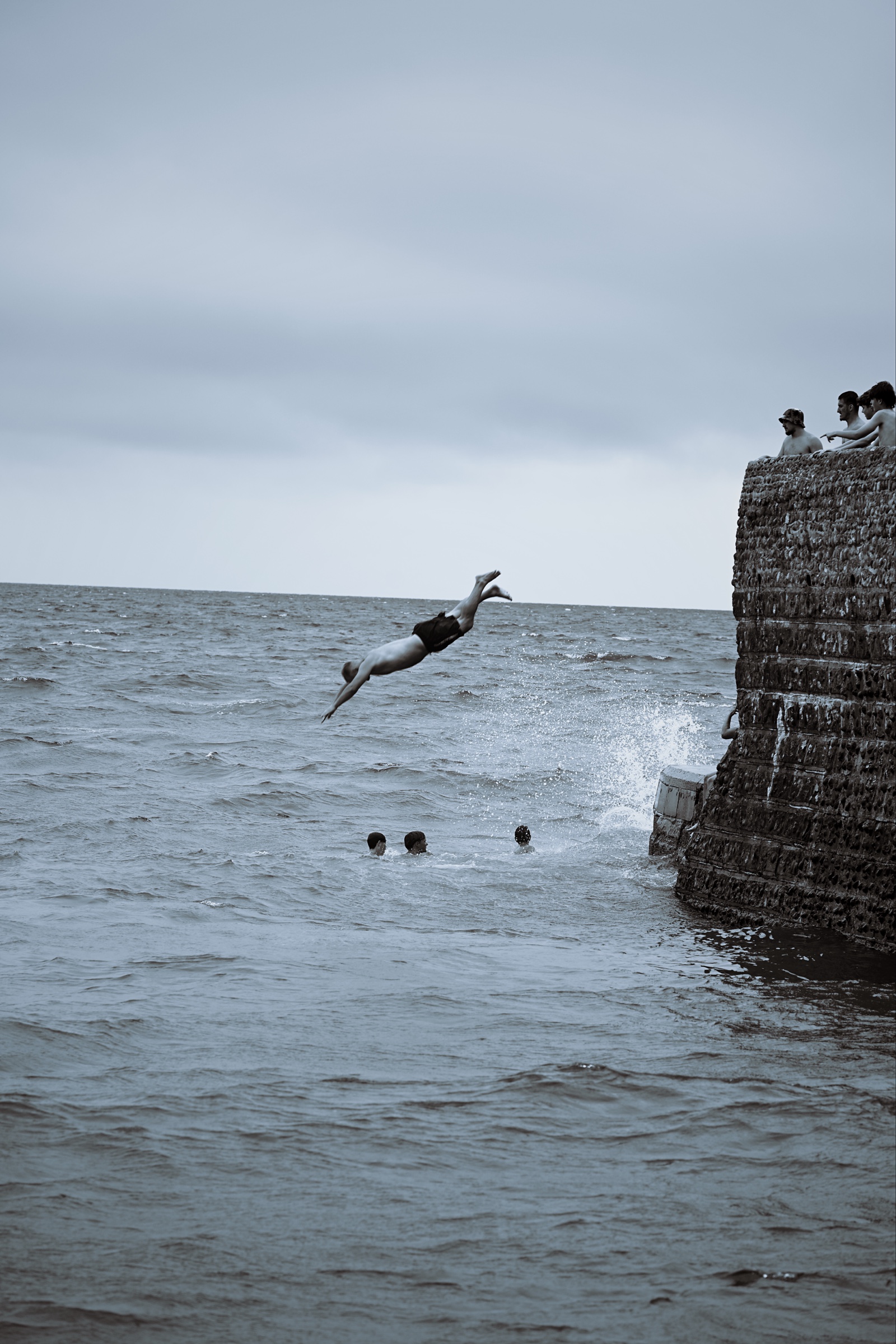 A diver suspended over the sea, from the ongoing Proof project